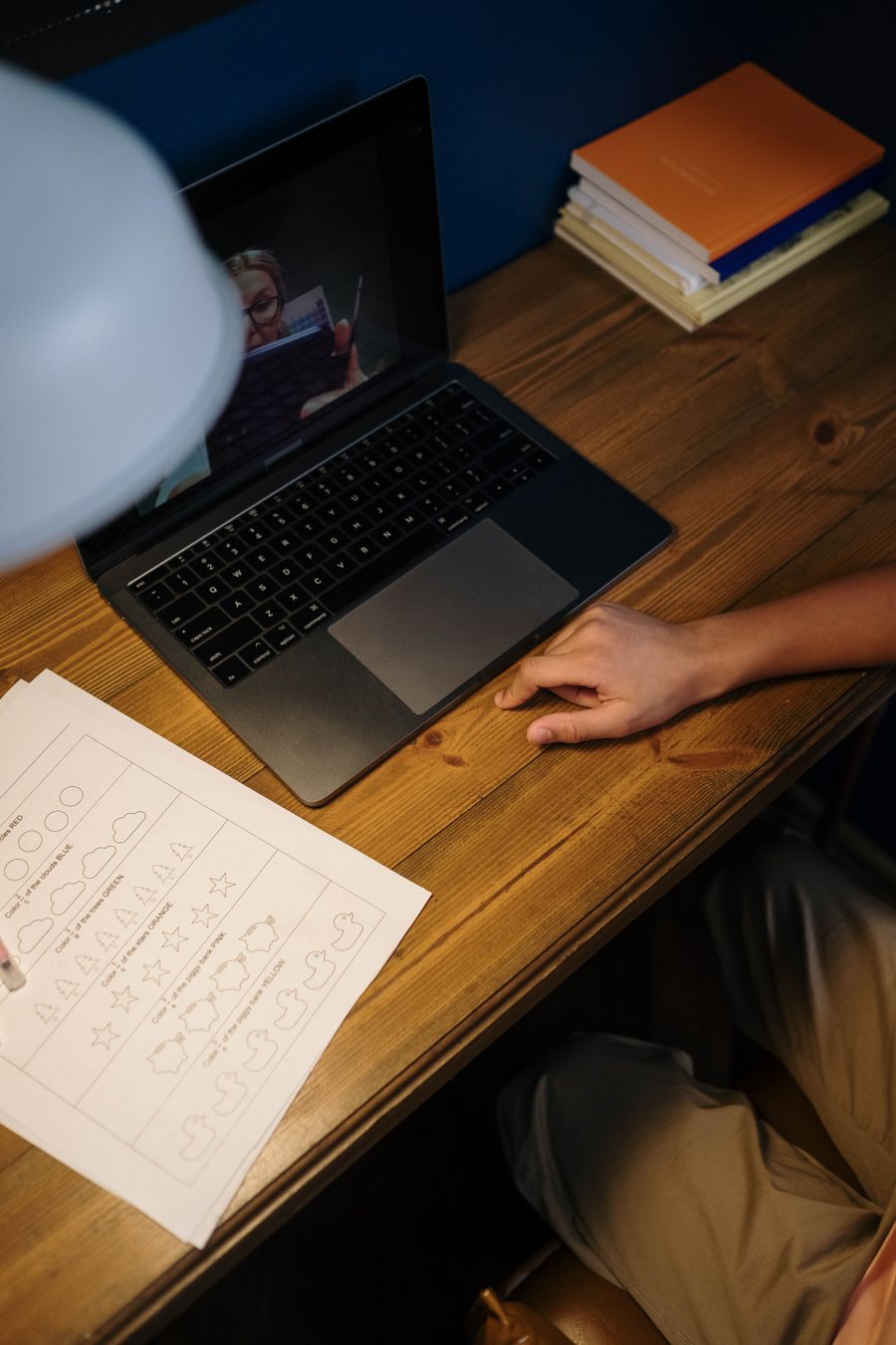 Professional studying with a laptop and notes